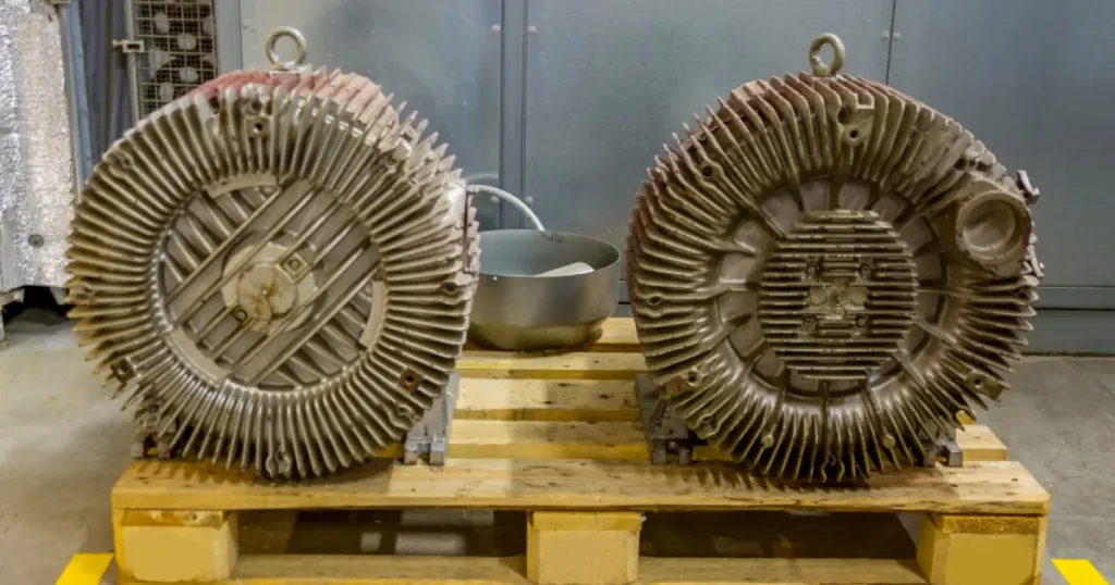 Damaged and worn-out motor casings demonstrating stages in electric motor life cycle.
