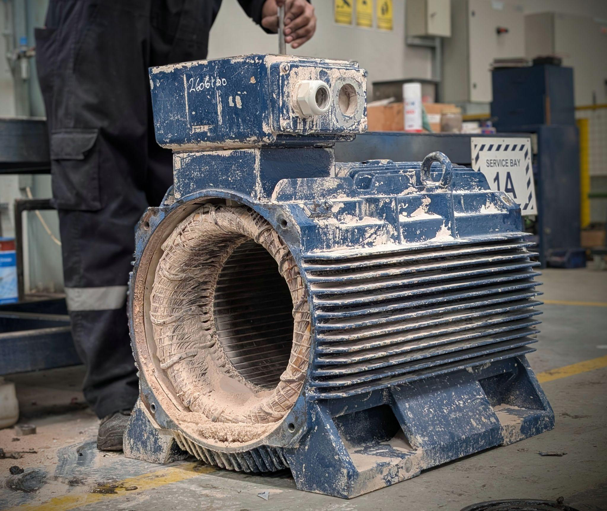 Daniel Group technician conducting professional electric motor overhaul at Service Bay 1A