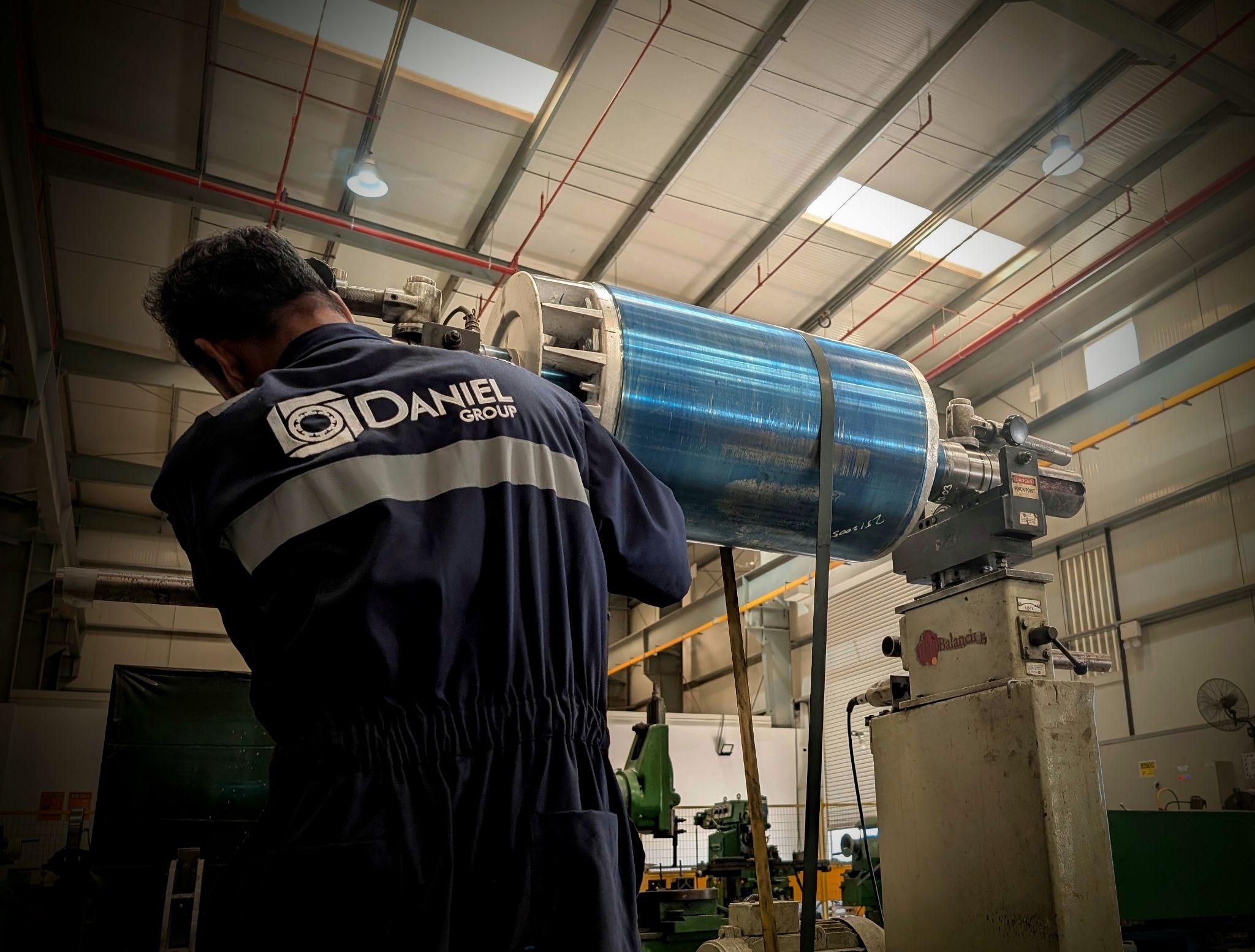 Daniel Group technician performing dynamic balancing of rotating machinery UAE